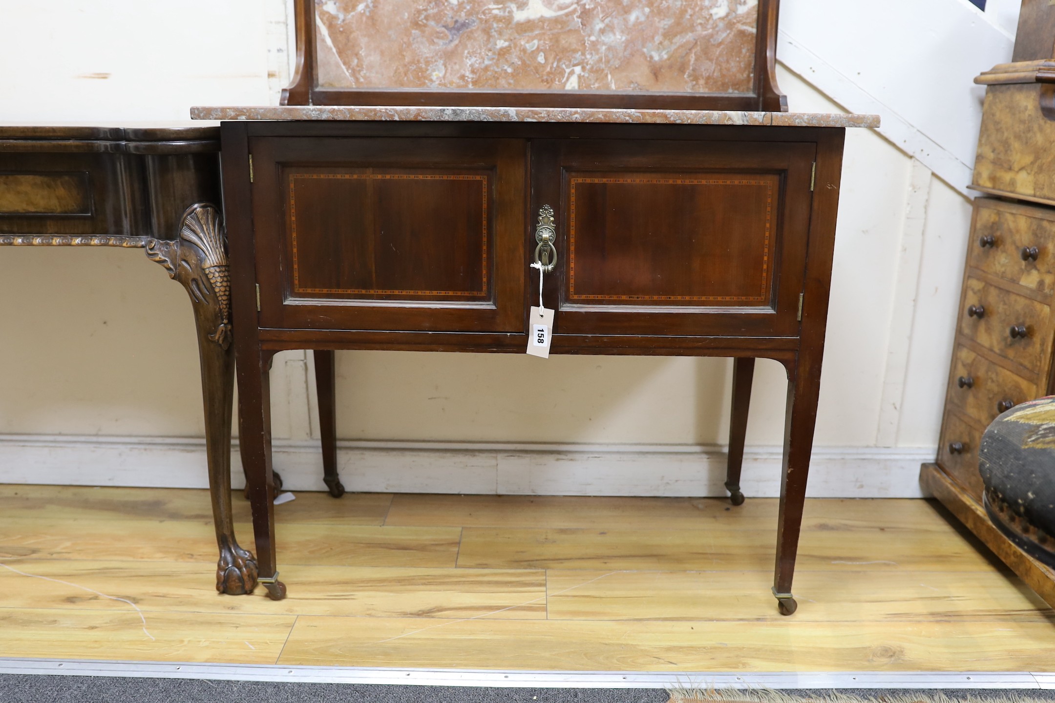 An Edwardian mahogany marble topped washstand, width 91cm, depth 51cm, height 122cm